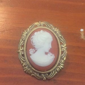 Carved cameo shell brooch pin